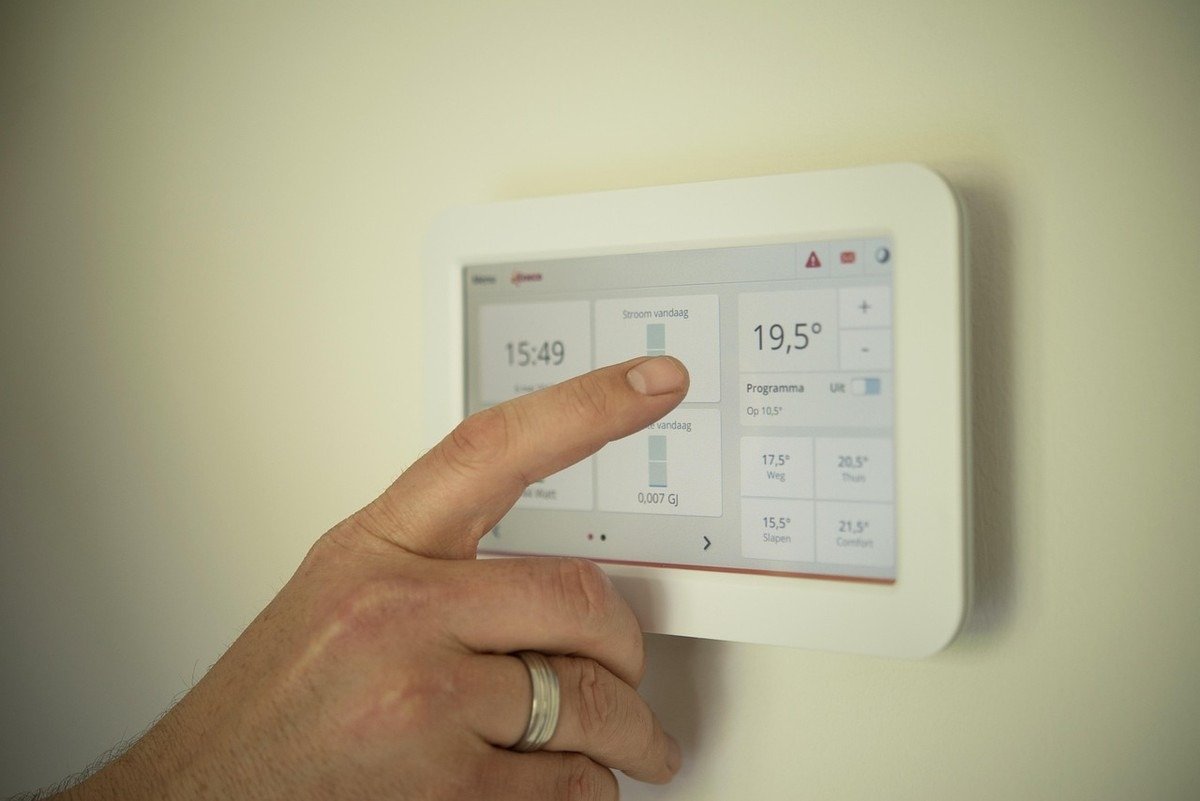 Ajustement de température sur un thermostat mural Ajustement de température sur un thermostat mural